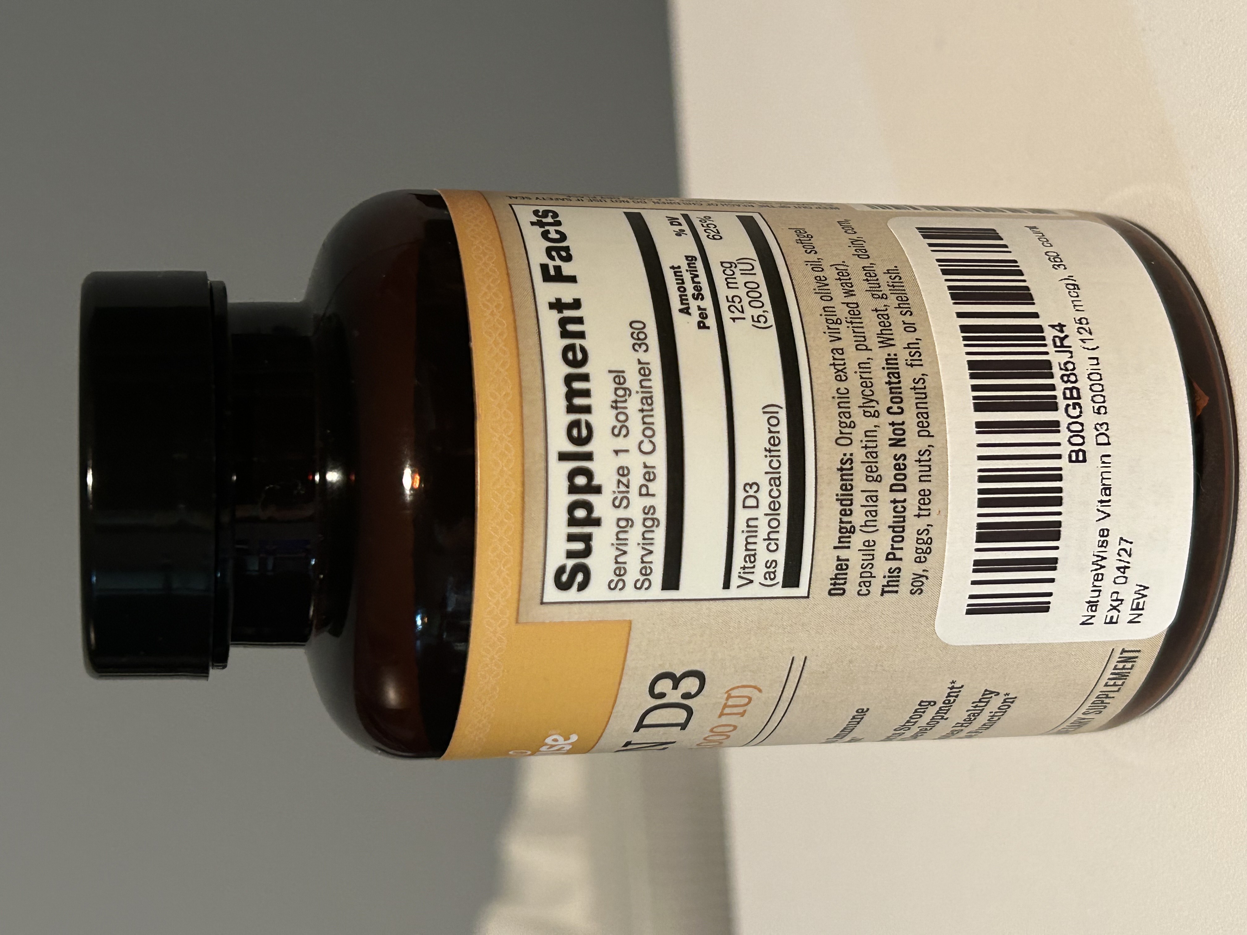 Incorrect label position on curved edge of bottle